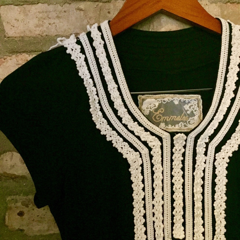 Adorable black dress with embroidered lace detail